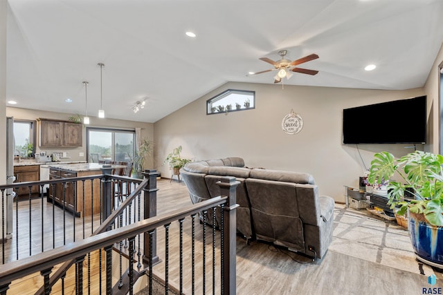 1716 E Tracy Ln, Sioux Falls, SD 57103 - living area with light wood-style flooring, lofted ceiling, a ceiling fan, and recessed lighting