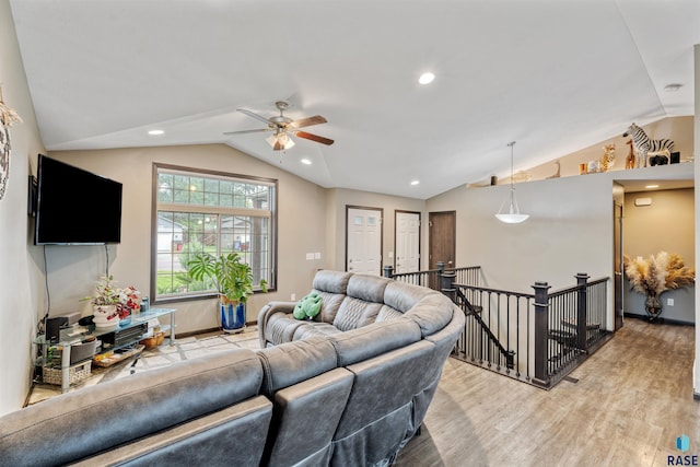 1716 E Tracy Ln, Sioux Falls, SD 57103 - living room featuring vaulted ceiling, light wood-style flooring, ceiling fan, and recessed lighting
