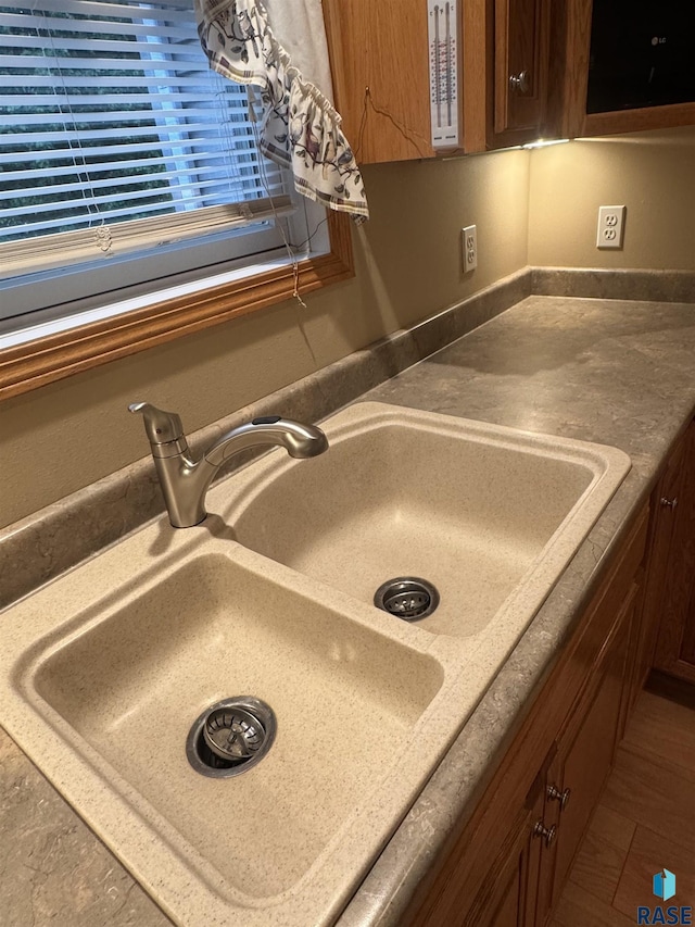 300 W Pipestone Ave, Flandreau, SD 57028 - kitchen view of a sink and dark countertops