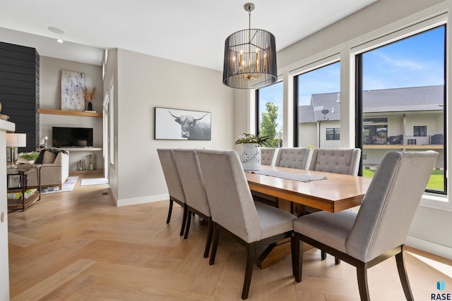 212 Autumnwood Ct, Sioux Falls, SD 57110 - dining space with plenty of natural light, baseboards, recessed lighting, and a chandelier