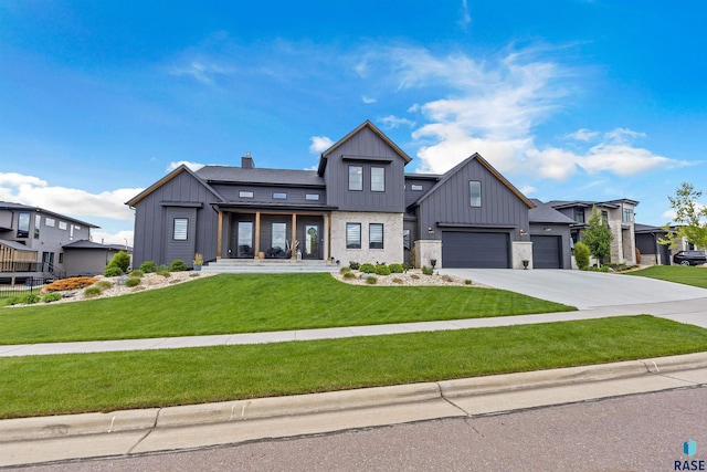 212 Autumnwood Ct, Sioux Falls, SD 57110 - modern farmhouse featuring board and batten siding, a front lawn, concrete driveway, an attached garage, and a chimney