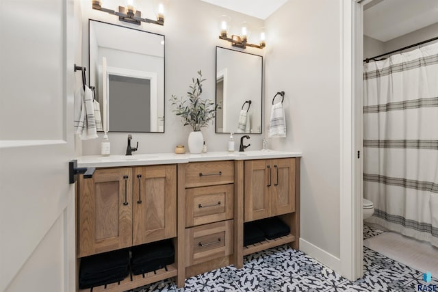 212 Autumnwood Ct, Sioux Falls, SD 57110 - bathroom with toilet, double vanity, baseboards, tile patterned floors, and curtained shower