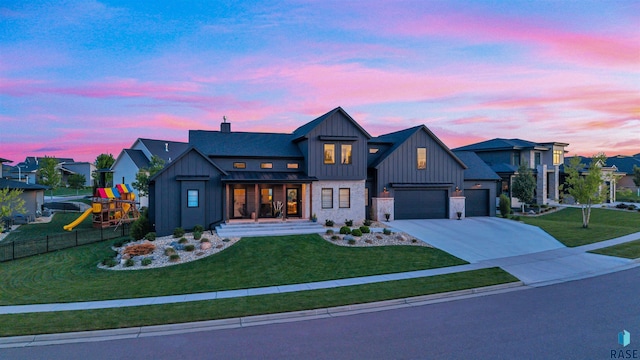 212 Autumnwood Ct, Sioux Falls, SD 57110 - modern farmhouse style home with board and batten siding, driveway, a porch, a playground, and a standing seam roof