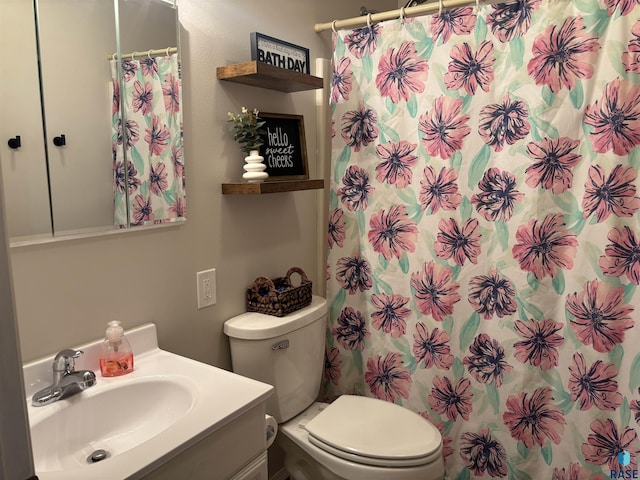 8000 W 44th St, Sioux Falls, SD 57106 - bathroom featuring toilet, vanity, and a shower with curtain