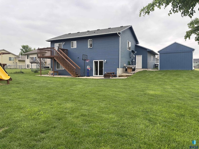 8000 W 44th St, Sioux Falls, SD 57106 - rear view of property with stairs and a wooden deck