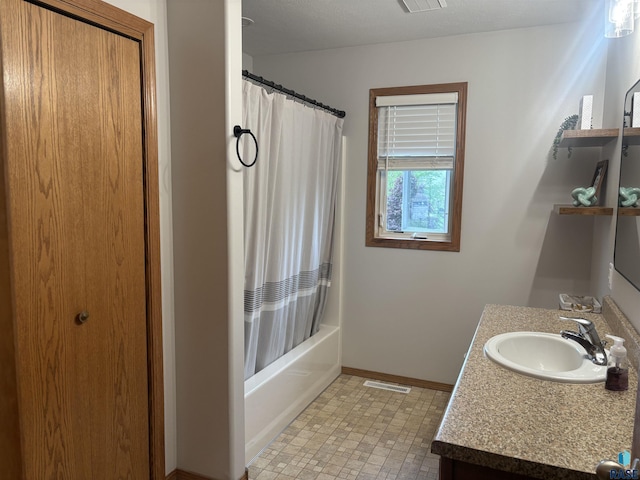 8000 W 44th St, Sioux Falls, SD 57106 - bathroom featuring vanity, baseboards, and shower / tub combo with curtain