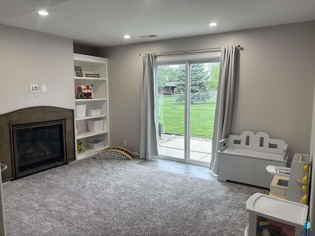 8000 W 44th St, Sioux Falls, SD 57106 - living room with recessed lighting and a glass covered fireplace