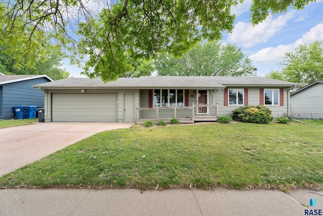 4201 E 22nd St, Sioux Falls, SD 57103 - ranch-style home featuring a porch, a garage, a front lawn, and driveway