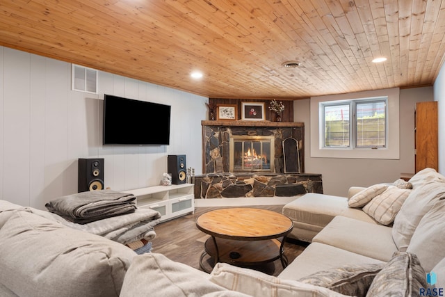 4201 E 22nd St, Sioux Falls, SD 57103 - living room with wood ceiling, a stone fireplace, wood finished floors, and recessed lighting