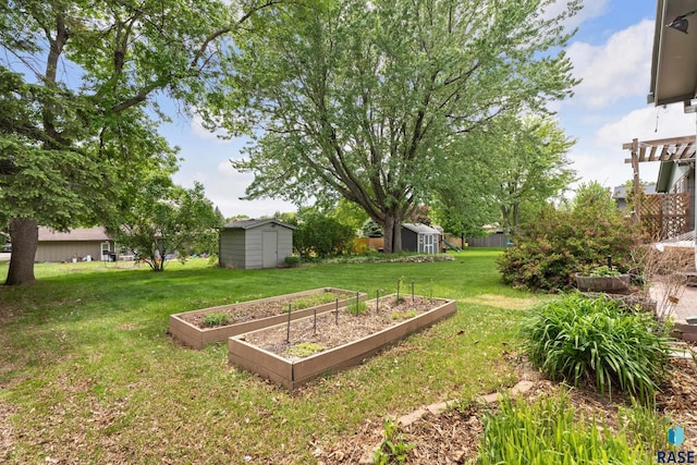 4201 E 22nd St, Sioux Falls, SD 57103 - view of green lawn featuring a vegetable garden