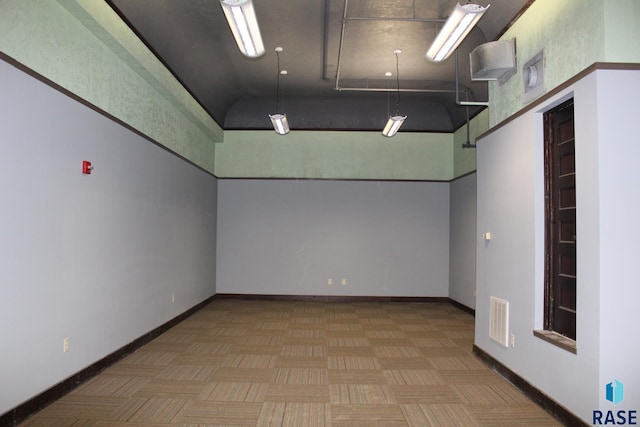109 E Luverne St Unit 220, Luverne, MN 56156 - carpeted empty room with a high ceiling and baseboards