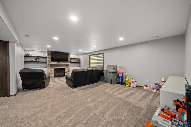 622 Creekside Trl, Harrisburg, SD 57032 - rec room with a fireplace, recessed lighting, and carpet