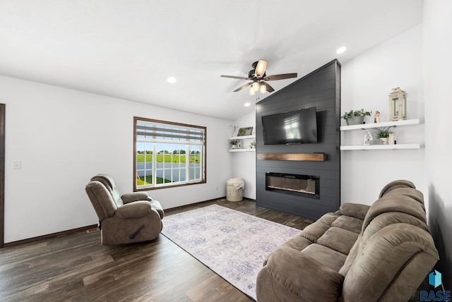 622 Creekside Trl, Harrisburg, SD 57032 - living room featuring a large fireplace, a ceiling fan, dark wood-style floors, vaulted ceiling, and recessed lighting