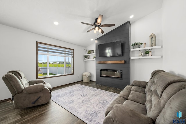 622 Creekside Trl, Harrisburg, SD 57032 - living room featuring vaulted ceiling, ceiling fan, dark wood finished floors, recessed lighting, and a fireplace