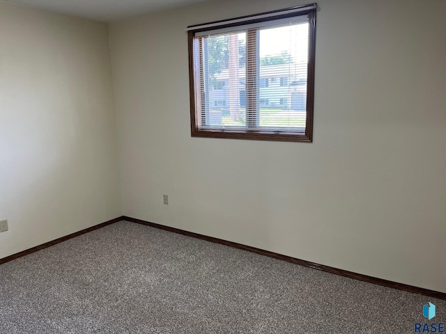 502 E 4th St, Canton, SD 57013 - unfurnished room featuring carpet floors and baseboards
