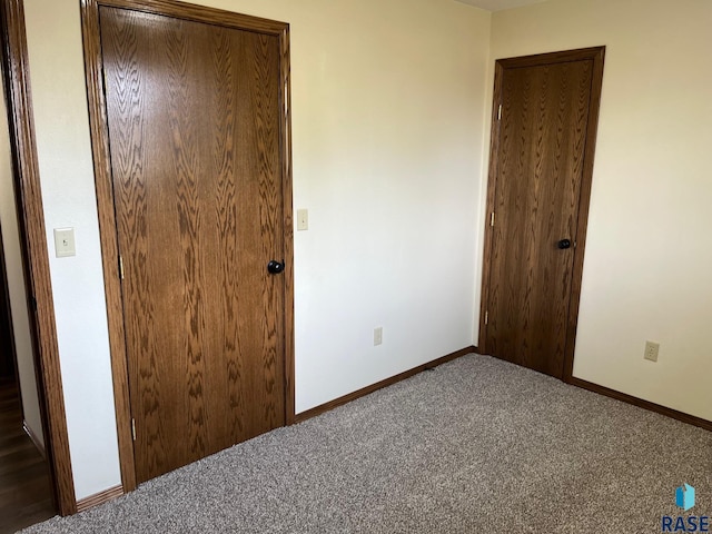 502 E 4th St, Canton, SD 57013 - unfurnished bedroom featuring carpet floors and baseboards