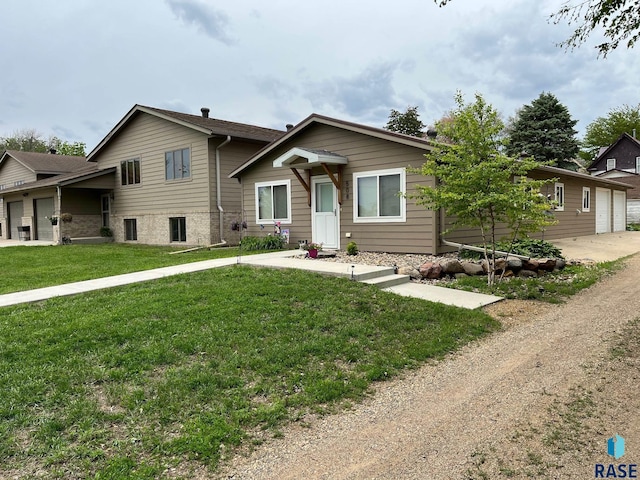 502 E 4th St, Canton, SD 57013 - tri-level home featuring a front lawn and driveway