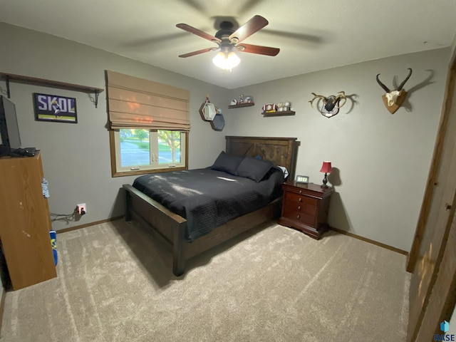 4604 S Woodwind Ln, Sioux Falls, SD 57103 - bedroom with carpet flooring, baseboards, and ceiling fan