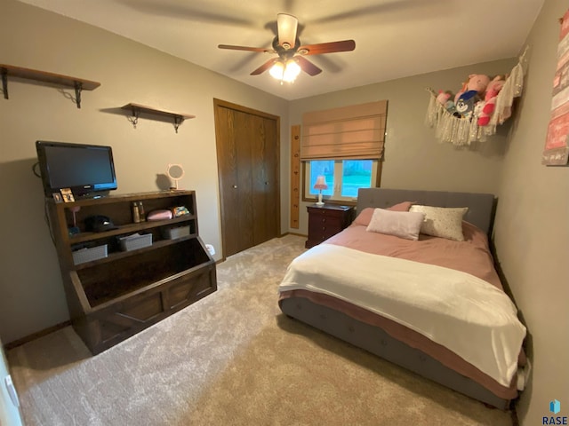 4604 S Woodwind Ln, Sioux Falls, SD 57103 - carpeted bedroom with a closet and a ceiling fan