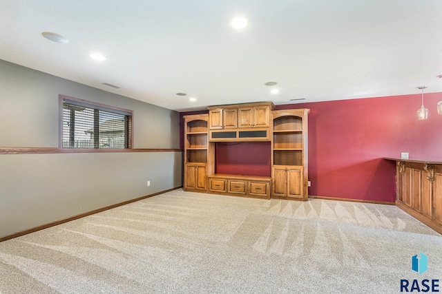 5205 S Culbert Ave, Sioux Falls, SD 57106 - unfurnished living room featuring light colored carpet, baseboards, and recessed lighting