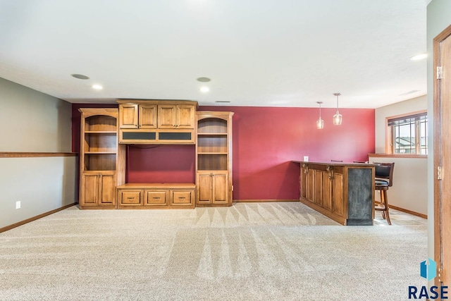 5205 S Culbert Ave, Sioux Falls, SD 57106 - unfurnished living room featuring baseboards, light carpet, and recessed lighting