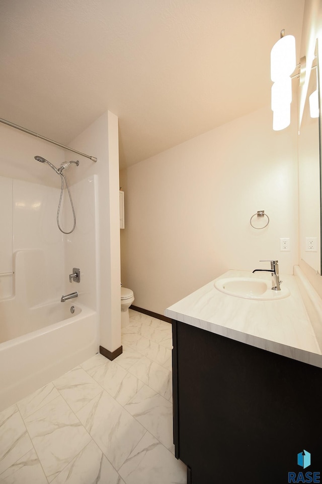 2407 E Copalis Pl, Sioux Falls, SD 57108 - full bath featuring toilet, vanity, marble finish floors, shower / bath combination, and baseboards