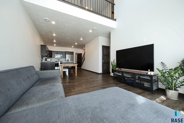 2407 E Copalis Pl, Sioux Falls, SD 57108 - living room featuring dark wood-type flooring and recessed lighting