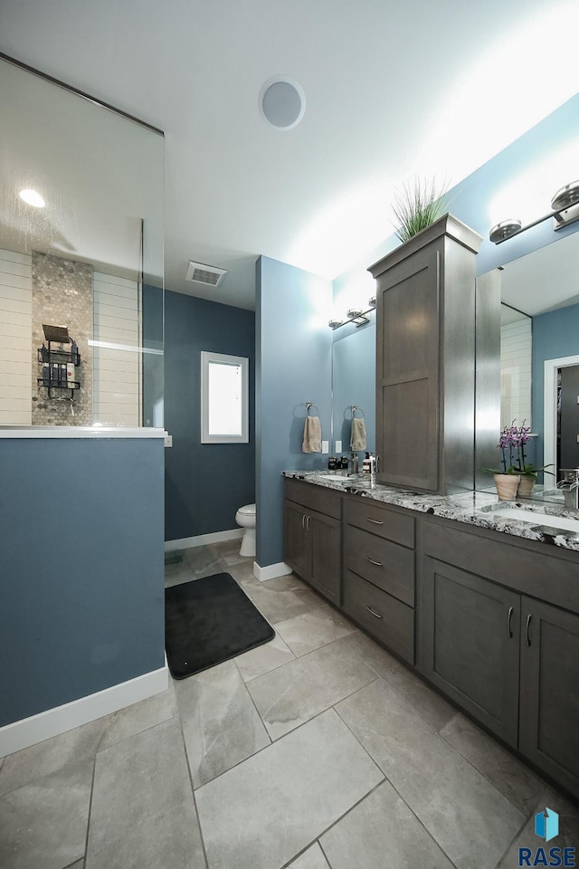 8609 E Fiddlewood Dr, Sioux Falls, SD 57110 - full bathroom featuring double vanity and walk in shower
