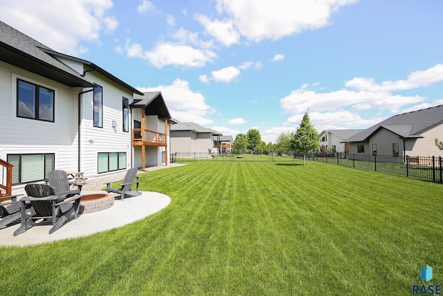 8609 E Fiddlewood Dr, Sioux Falls, SD 57110 - view of yard with a patio area, an outdoor fire pit, a residential view, and a balcony
