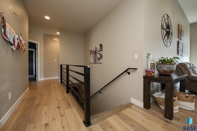 8609 E Fiddlewood Dr, Sioux Falls, SD 57110 - staircase featuring wood finished floors and recessed lighting