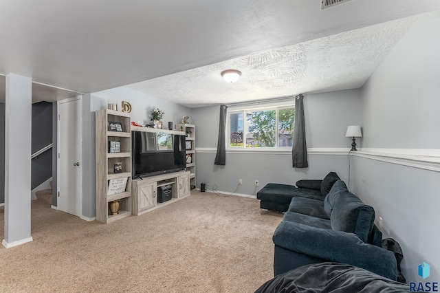 7104 W 68th St, Sioux Falls, SD 57106 - living room with carpet, a textured ceiling, and baseboards