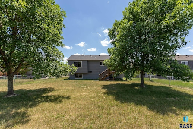 7104 W 68th St, Sioux Falls, SD 57106 - view of yard featuring stairway