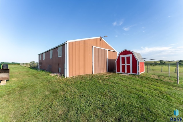 46493 258th St, Hartford, SD 57033 - view of pole building featuring a storage unit