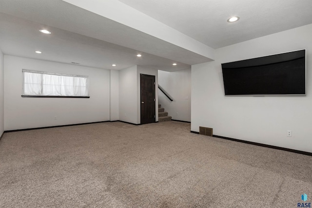 9509 W Liam St, Sioux Falls, SD 57106 - unfurnished room with recessed lighting, carpet flooring, stairway, and baseboards