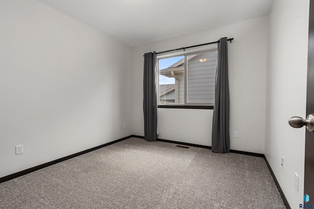 9509 W Liam St, Sioux Falls, SD 57106 - carpeted empty room with baseboards