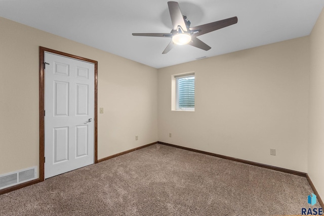 25280 480th Ave, Garretson, SD 57030 - empty room featuring carpet, a ceiling fan, and baseboards
