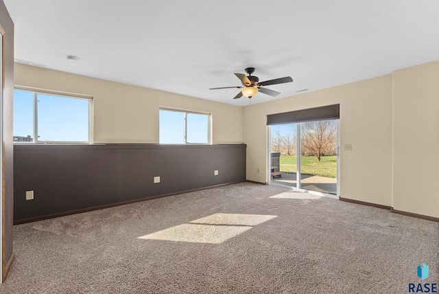 25280 480th Ave, Garretson, SD 57030 - empty room featuring carpet flooring, a ceiling fan, baseboards, and a smoke detector