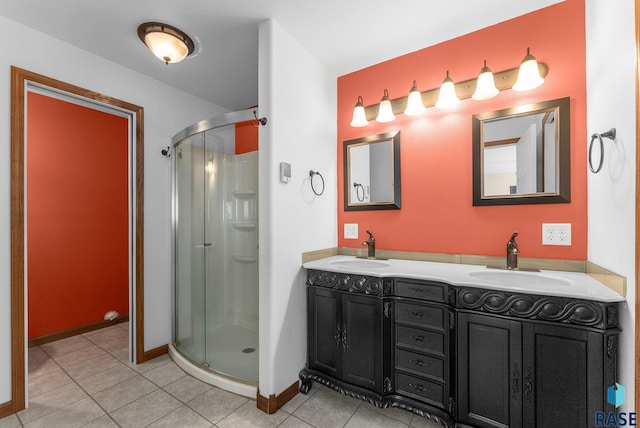 25280 480th Ave, Garretson, SD 57030 - bathroom featuring a shower stall, double vanity, tile patterned floors, and baseboards