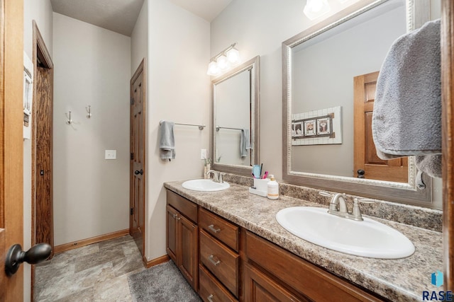 4314 W Shipton St, Sioux Falls, SD 57108 - full bath with double vanity and baseboards