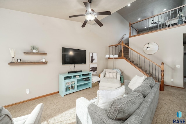 4314 W Shipton St, Sioux Falls, SD 57108 - carpeted living room with a ceiling fan, stairs, baseboards, high vaulted ceiling, and recessed lighting
