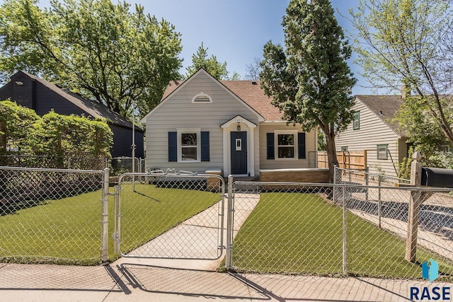 1205 W 14th St, Sioux Falls, SD 57104 - view of front of home featuring a gate and a shingled roof