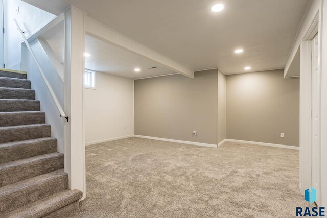 1205 W 14th St, Sioux Falls, SD 57104 - basement featuring recessed lighting, stairway, carpet, and baseboards