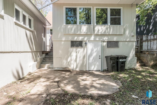 1205 W 14th St, Sioux Falls, SD 57104 - view of side of home featuring a patio area