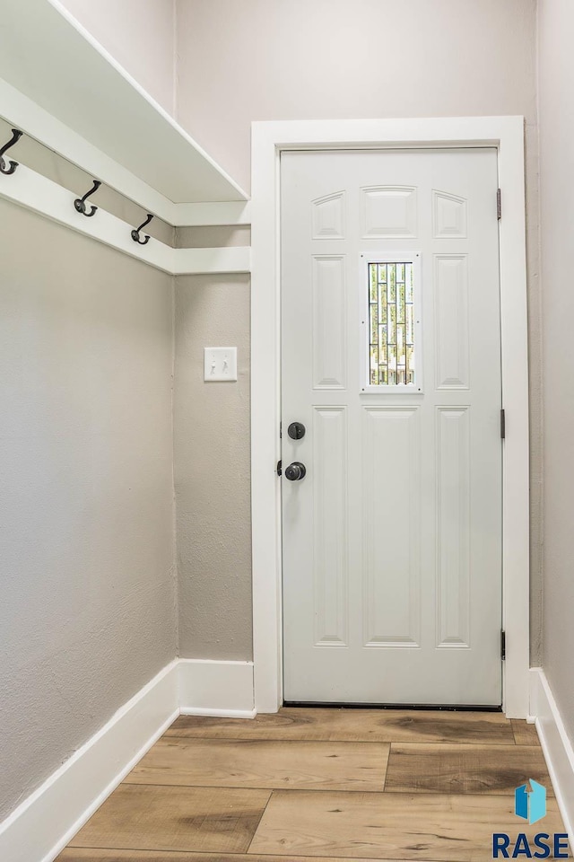 1205 W 14th St, Sioux Falls, SD 57104 - mudroom featuring light wood-style flooring and baseboards