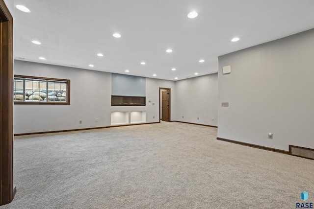 2813 W Stratton Cir, Sioux Falls, SD 57108 - empty room featuring carpet floors, baseboards, and recessed lighting