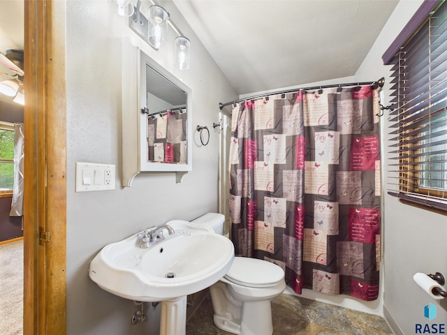 45390 284th St, Hurley, SD 57036 - bathroom featuring toilet and a shower with curtain