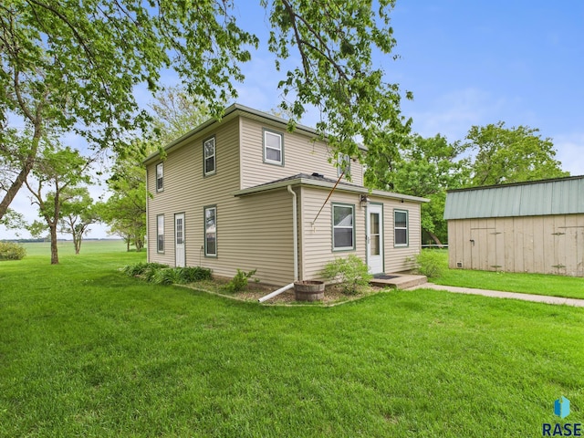 45390 284th St, Hurley, SD 57036 - rear view of house with a yard
