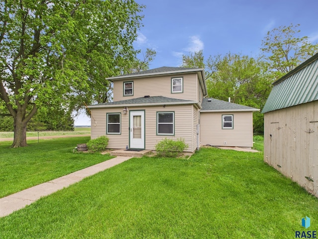 45390 284th St, Hurley, SD 57036 - view of front of house with a front yard and roof with shingles