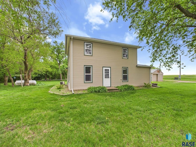 45390 284th St, Hurley, SD 57036 - back of property with a lawn