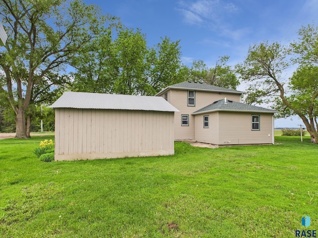 45390 284th St, Hurley, SD 57036 - rear view of property featuring a yard